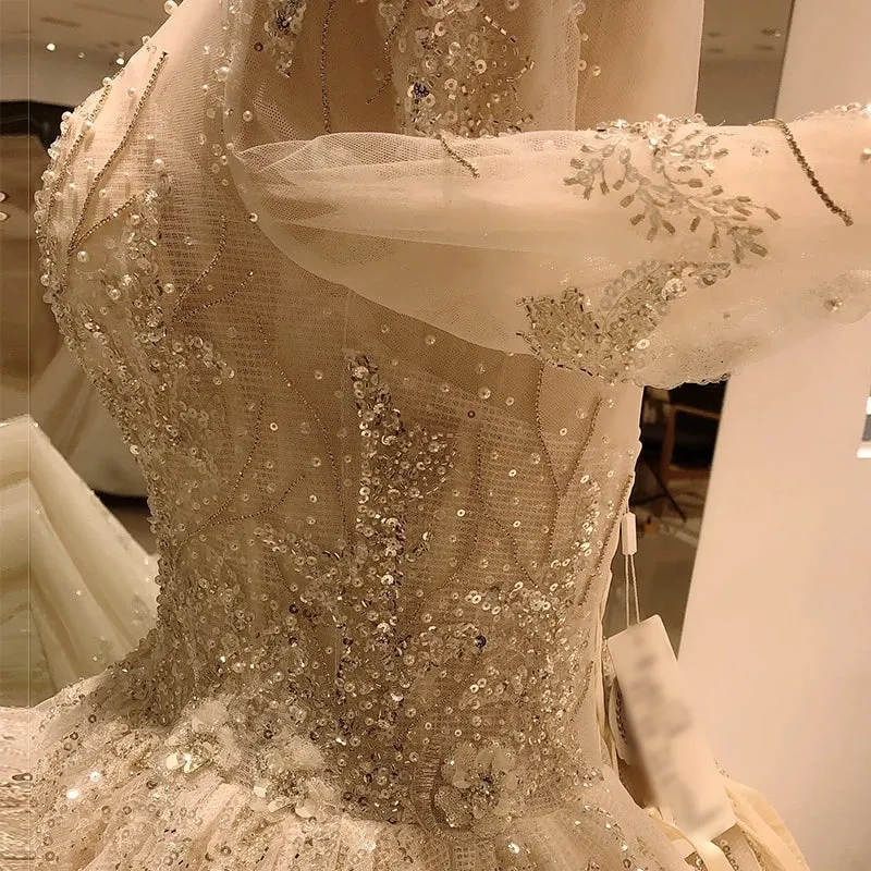 Heavy beading long sleeve wedding gown with sequin
