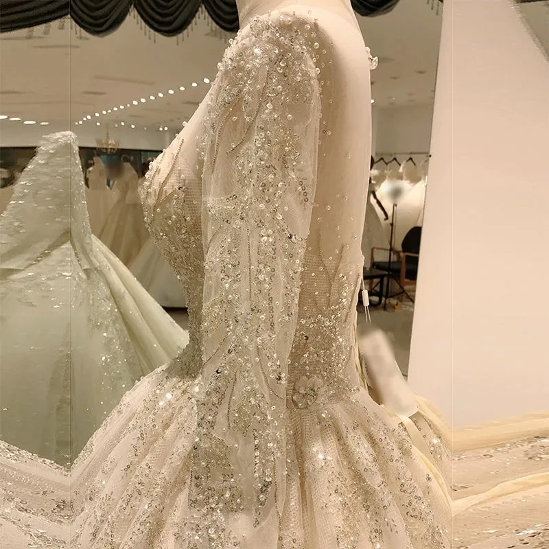 Heavy beading long sleeve wedding gown with sequin