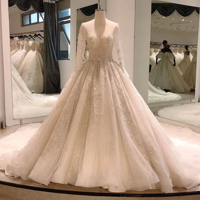 Heavy beading long sleeve wedding gown with sequin