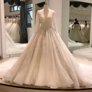 Heavy beading long sleeve wedding gown with sequin