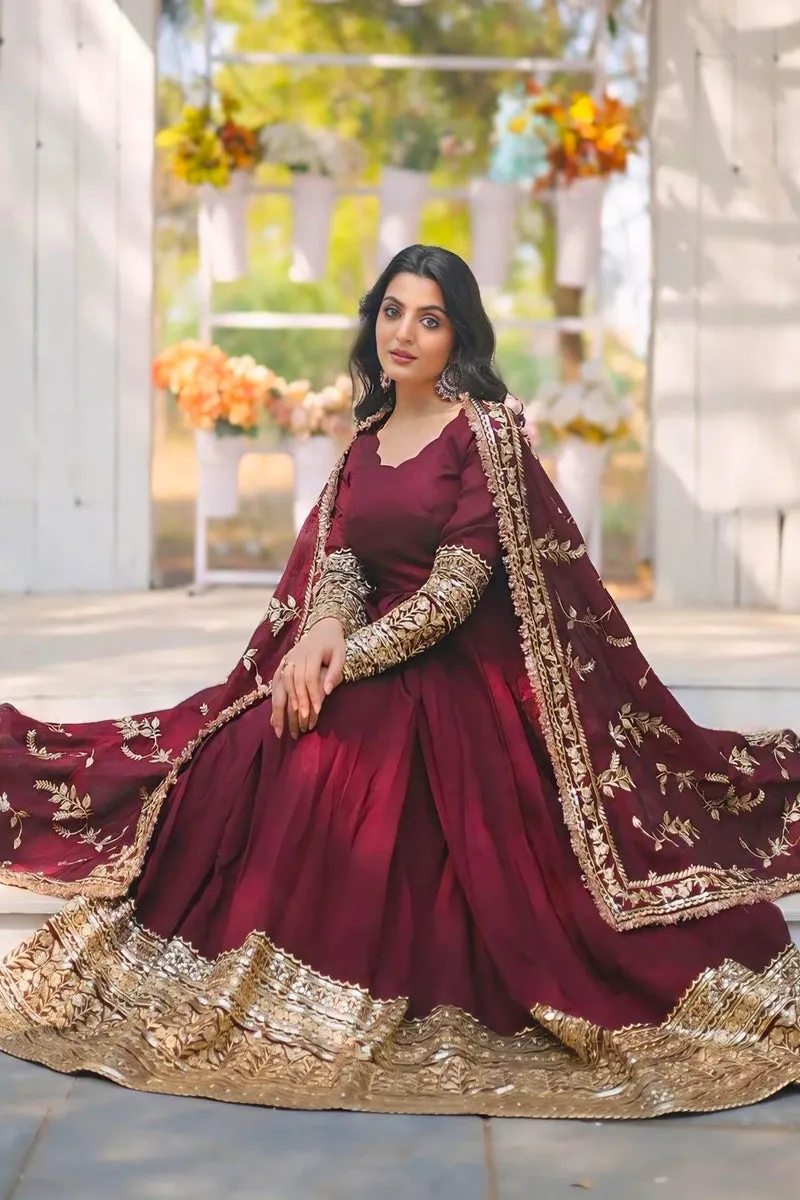 Traditional Maroon Gown With Golden Embroidery For Wedding