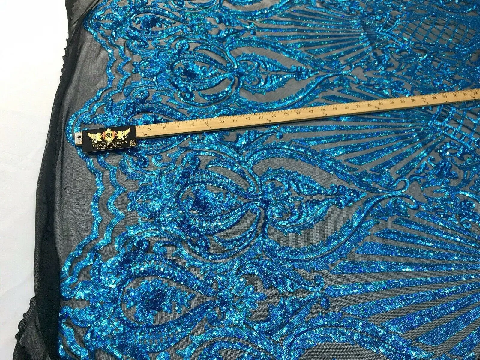 Turquoise iridescent damask sequin design on a 4 way stretch black mesh-dresses-prom-nightgown-sold by the yard-free shipping in the USA-
